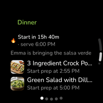 The KiWi meal plan on a round Wear OS watch, showing tonight’s dinner, when to start and who is bringing what